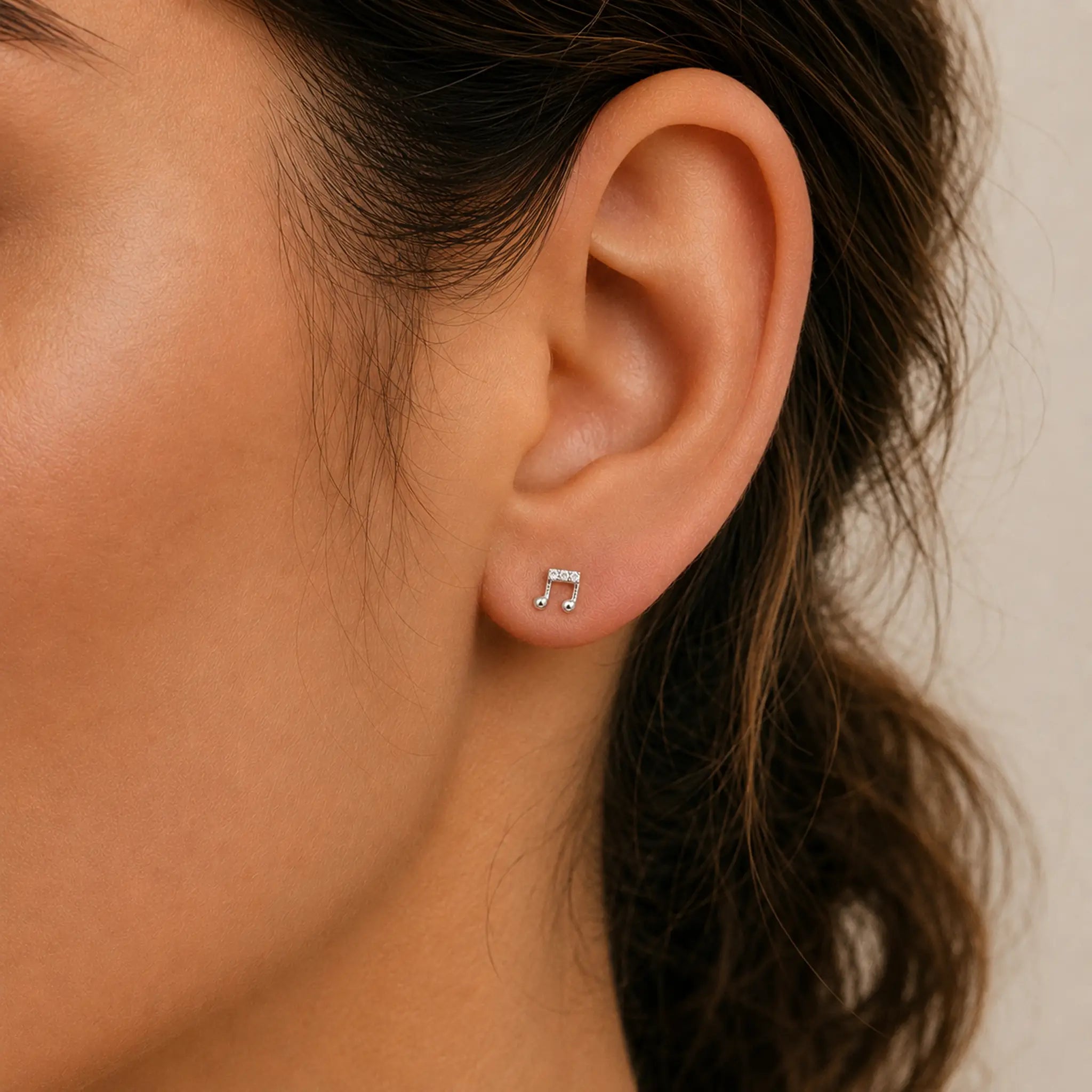 Titan Ohrstecker Musiknote mit Zirkonia