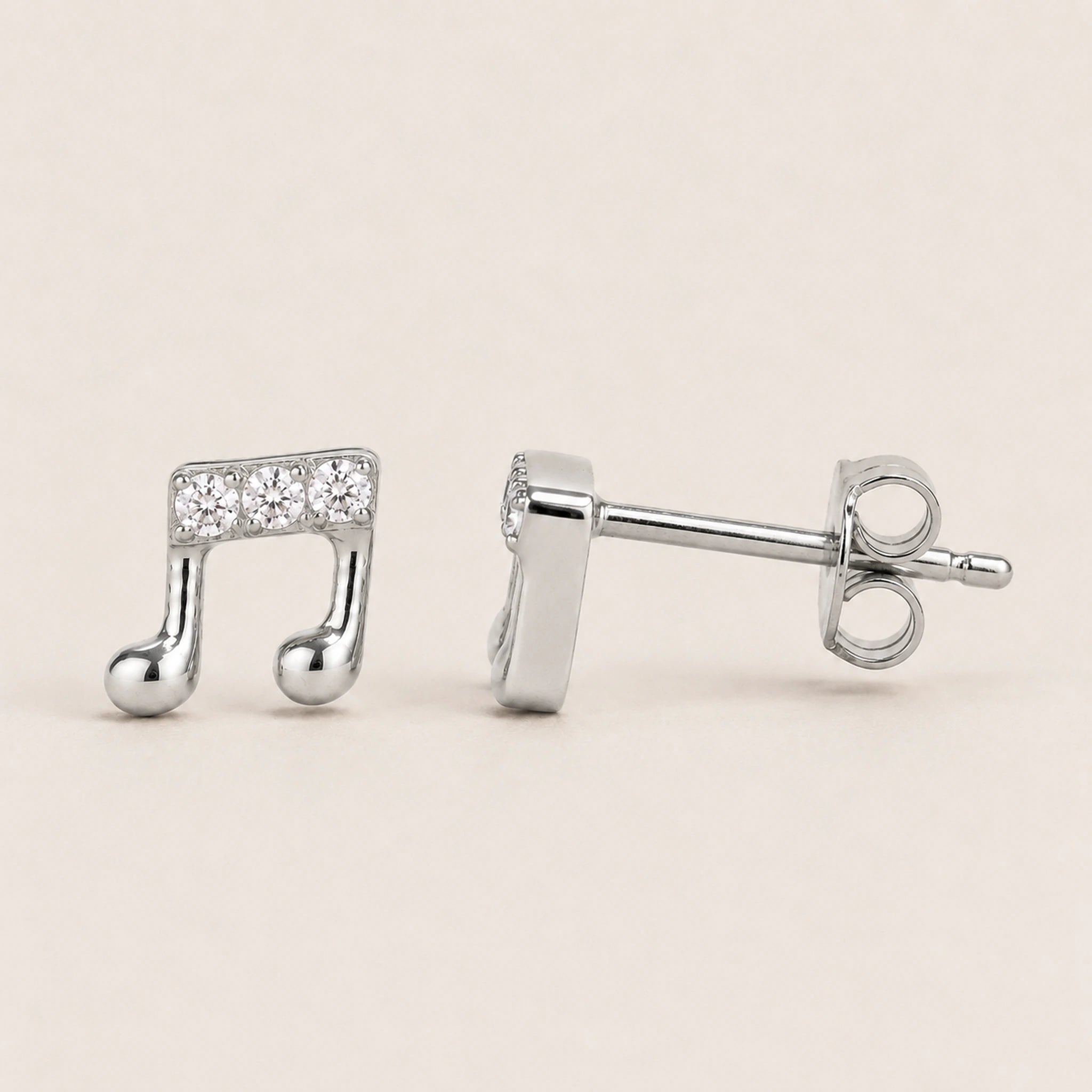 Titan Ohrstecker Musiknote mit Zirkonia